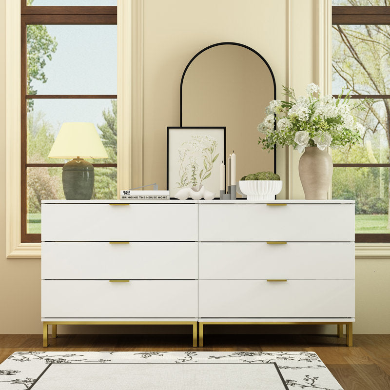 Elegant Bedroom Dresser with Gold Hardware and Elevated Base