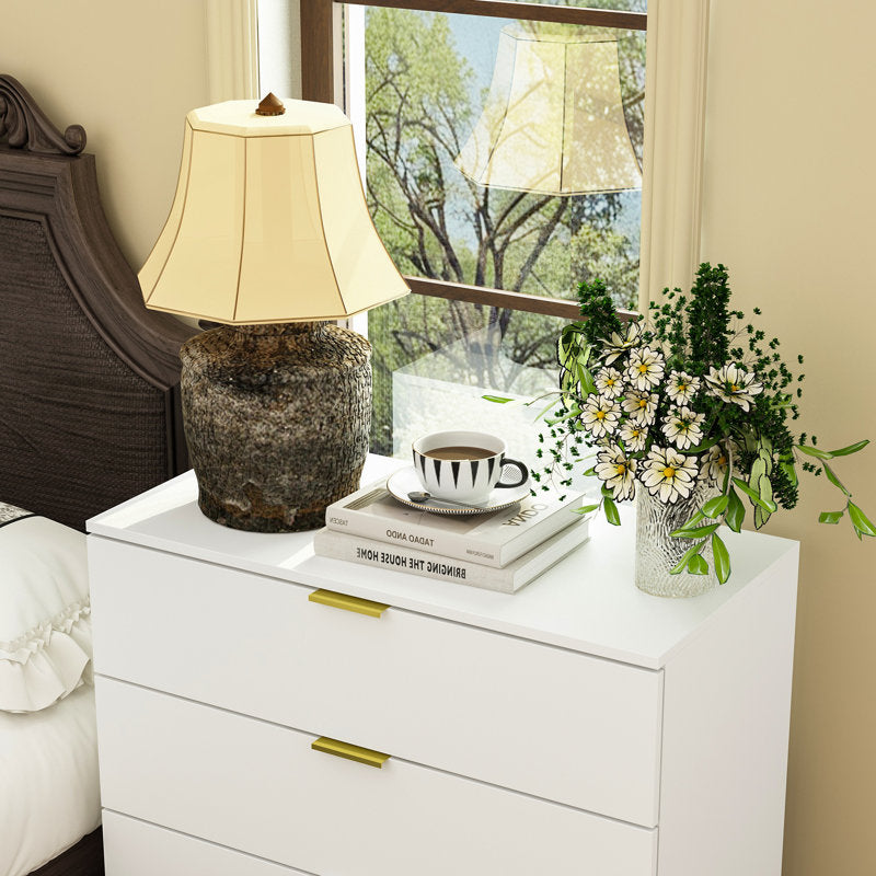 Elegant Bedroom Dresser with Gold Hardware and Elevated Base