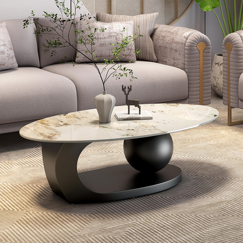 Modern Oval Marble Center Table Featuring Artistic Black Curved Base Design