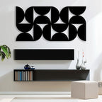 Artistic Wall Decor with Black Cutout Geometric Forms