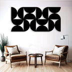Artistic Wall Decor with Black Cutout Geometric Forms