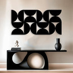 Artistic Wall Decor with Black Cutout Geometric Forms
