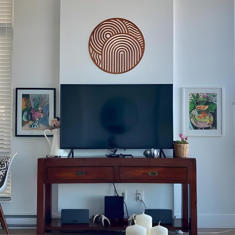 Contemporary Round Wood Wall Accent with Cut-Out Shapes