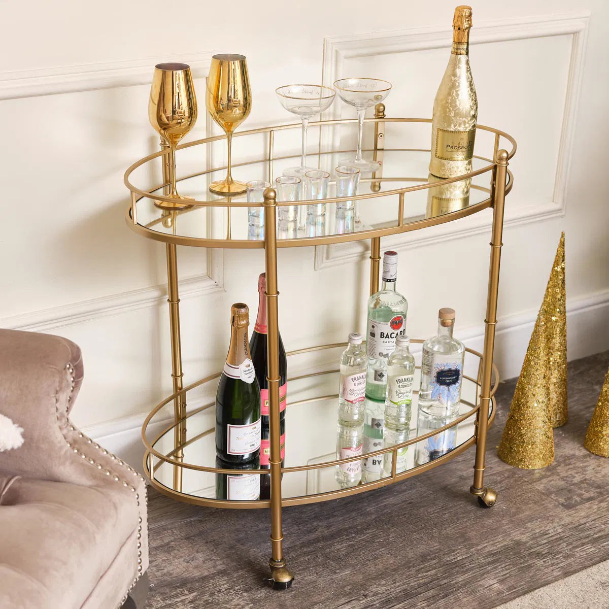 Golden Glamour Oval Drinks Trolley with Mirrored Elegance